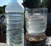 Agua salida depuradora y agua reactor en sedimentaci&oacute;n